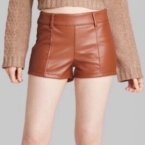NEW Women's High-Rise Faux Leather Shorts
- Wild Fable Brown. Size 17
